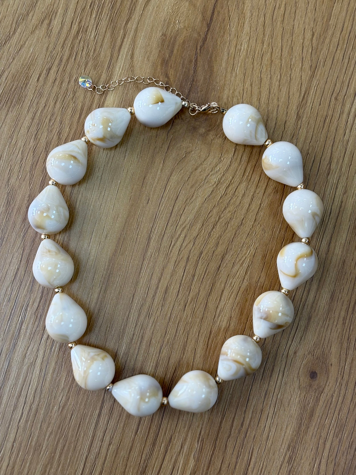 COLLAR BOLA BEIGE