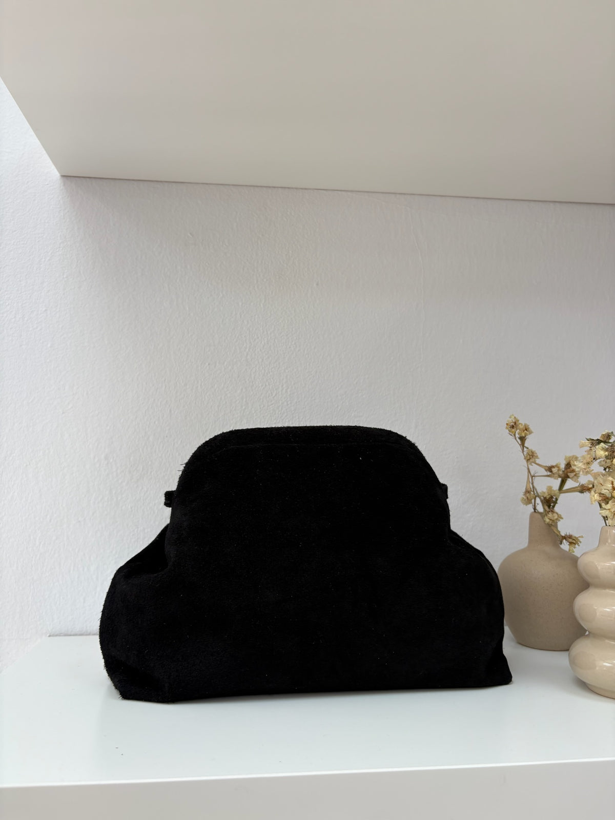 Clutch piel negro