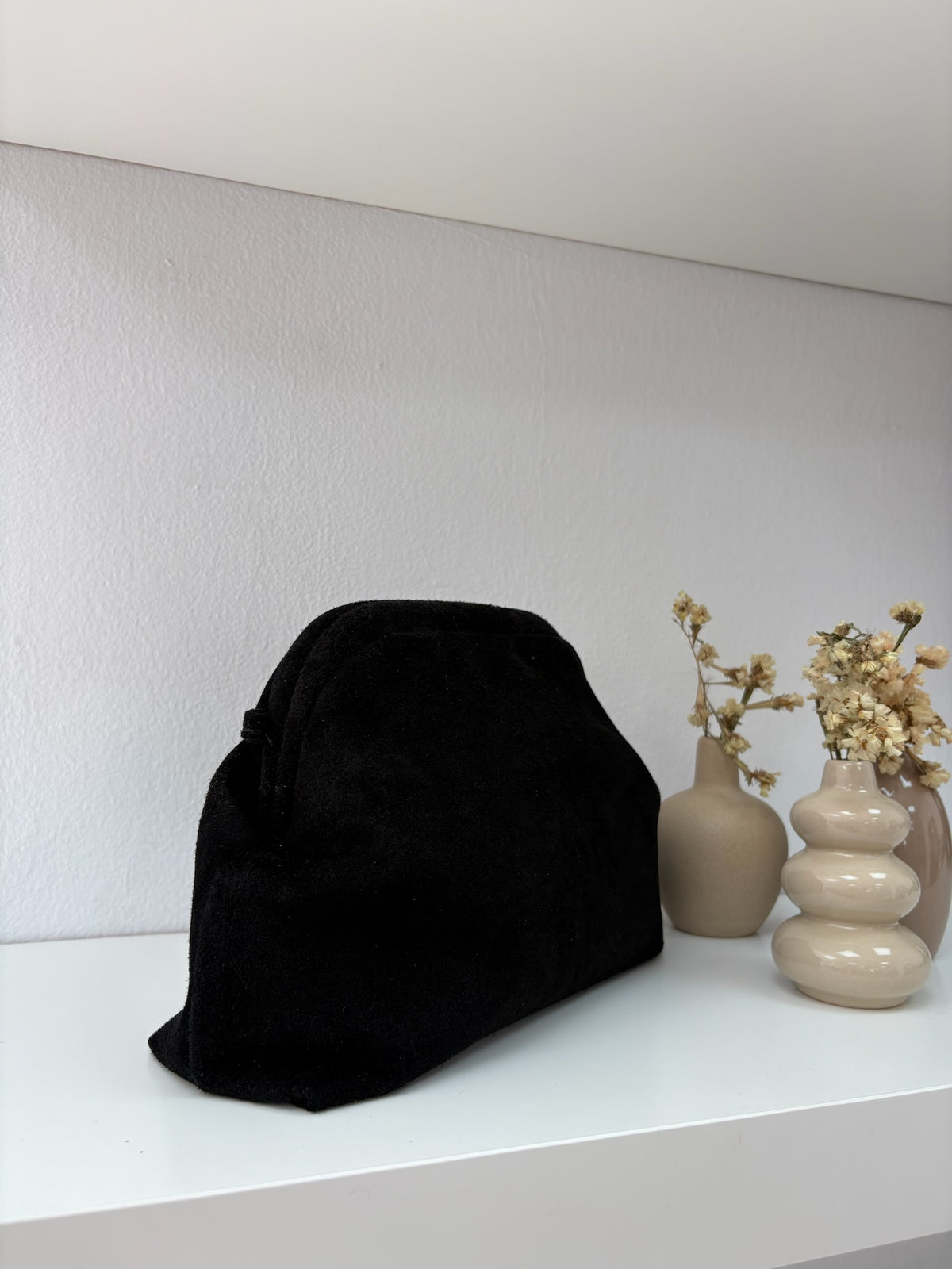 Clutch piel negro
